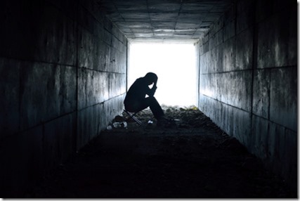 depressed man sitting in the tunnel ใชใผใใคใฌใผ๏ผ